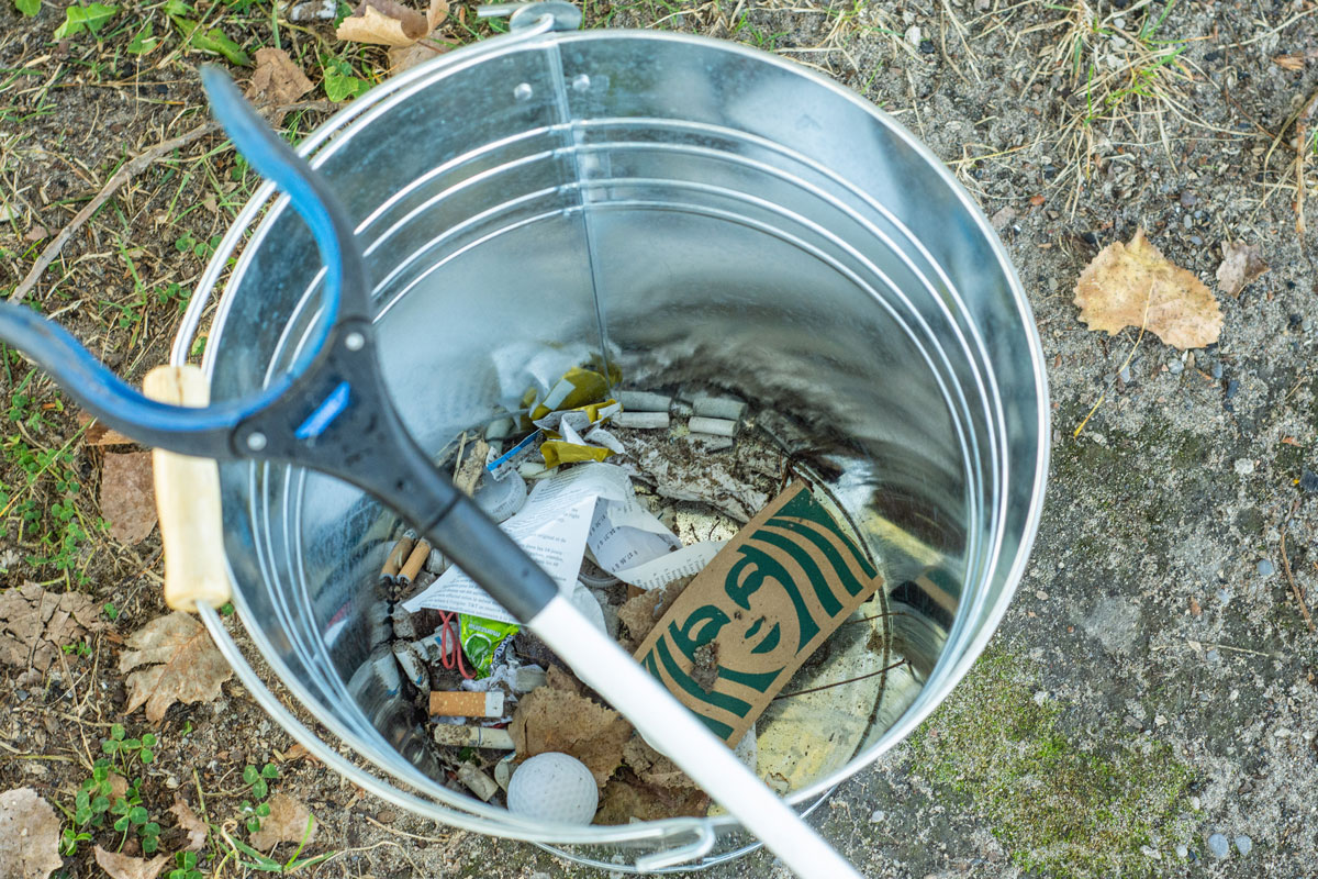 bucket with litter starbucks coffee sleeve