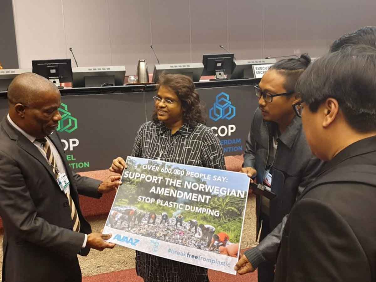 The presentation of the petition of more than 700,000 people supporting the Norway amendment to the President of the Basel Convention by Mageswari Sangaralingam, Prigi Arisandi and Von Hernandez.