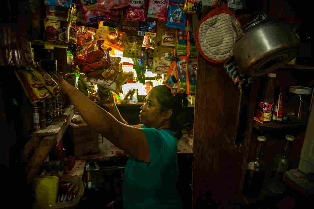 woman-in-sari-sari-store-philippines